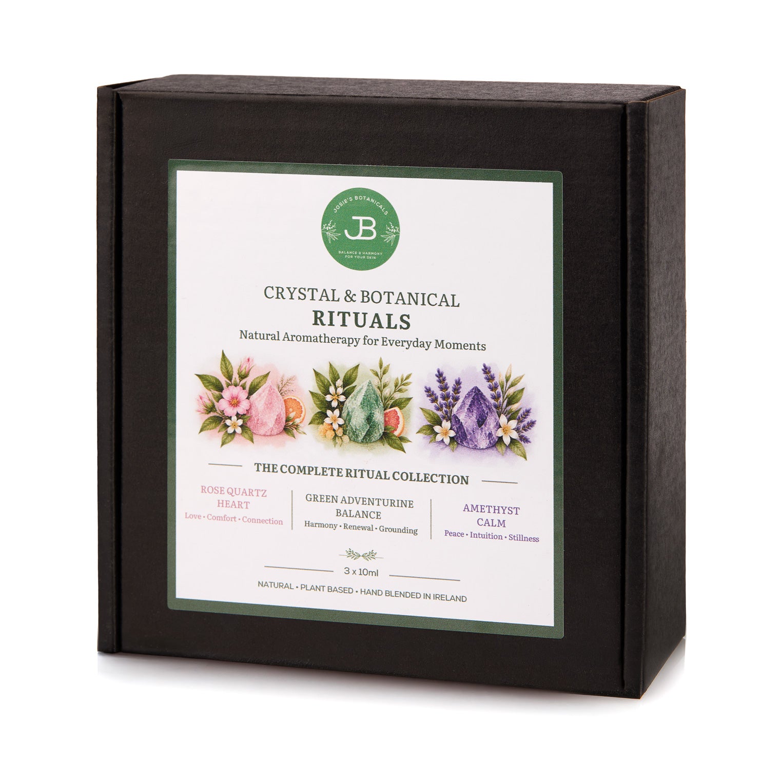 Crystal Ritual Collection trio aromatherapy gift set in black presentation box featuring Rose Quartz, Green Aventurine and Amethyst
