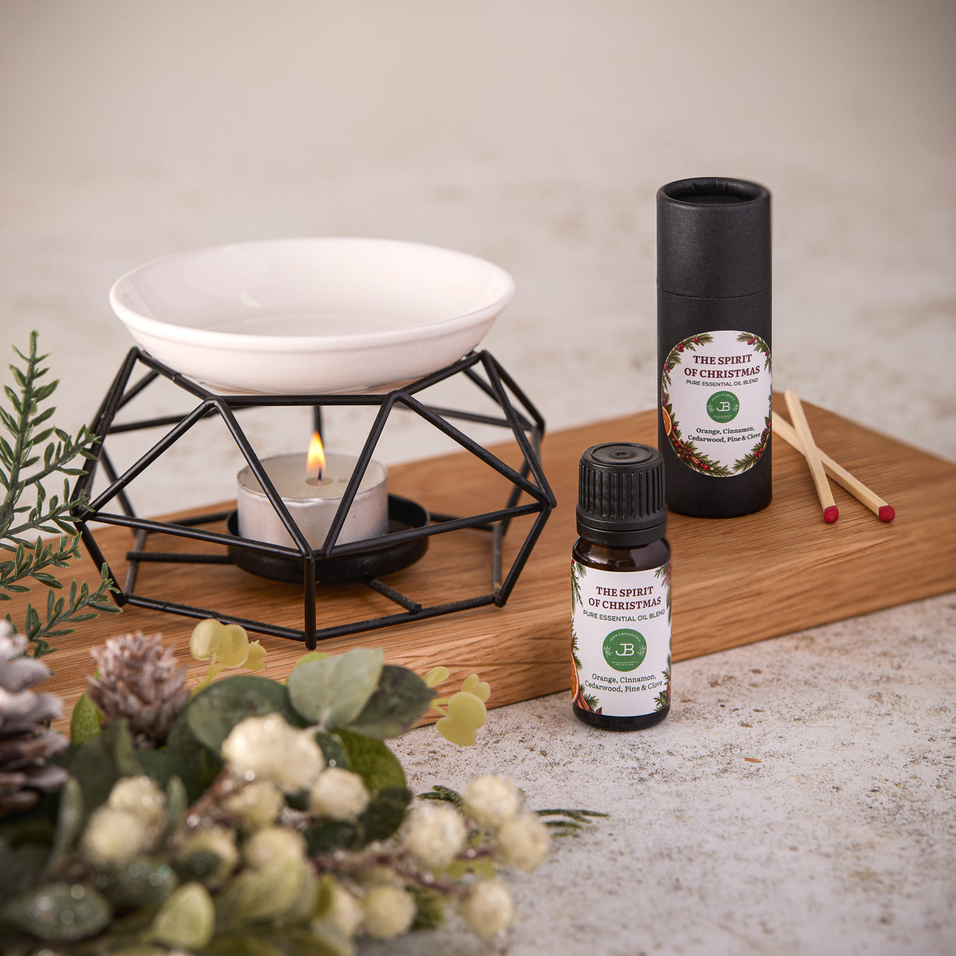 Spirit of Christmas essential oil blend and black geometric oil burner gift set by Josie's Botanicals