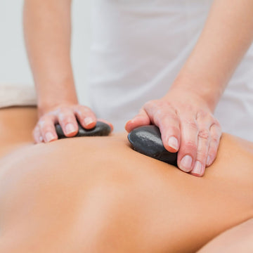 Hot Stone Massage - Holistic Therapies | Josie’s Botanicals